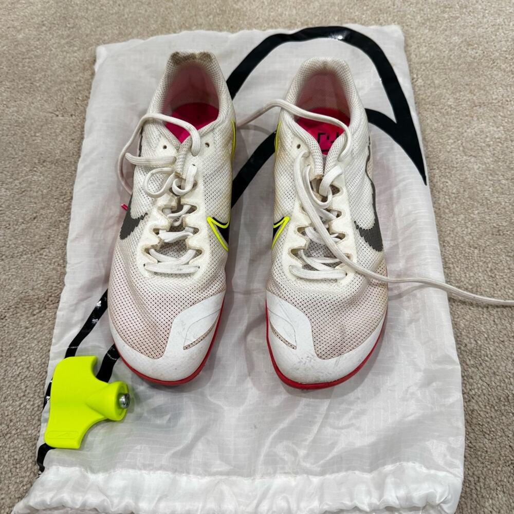 Nike White and Pink Spiked Running Shoes, size 6